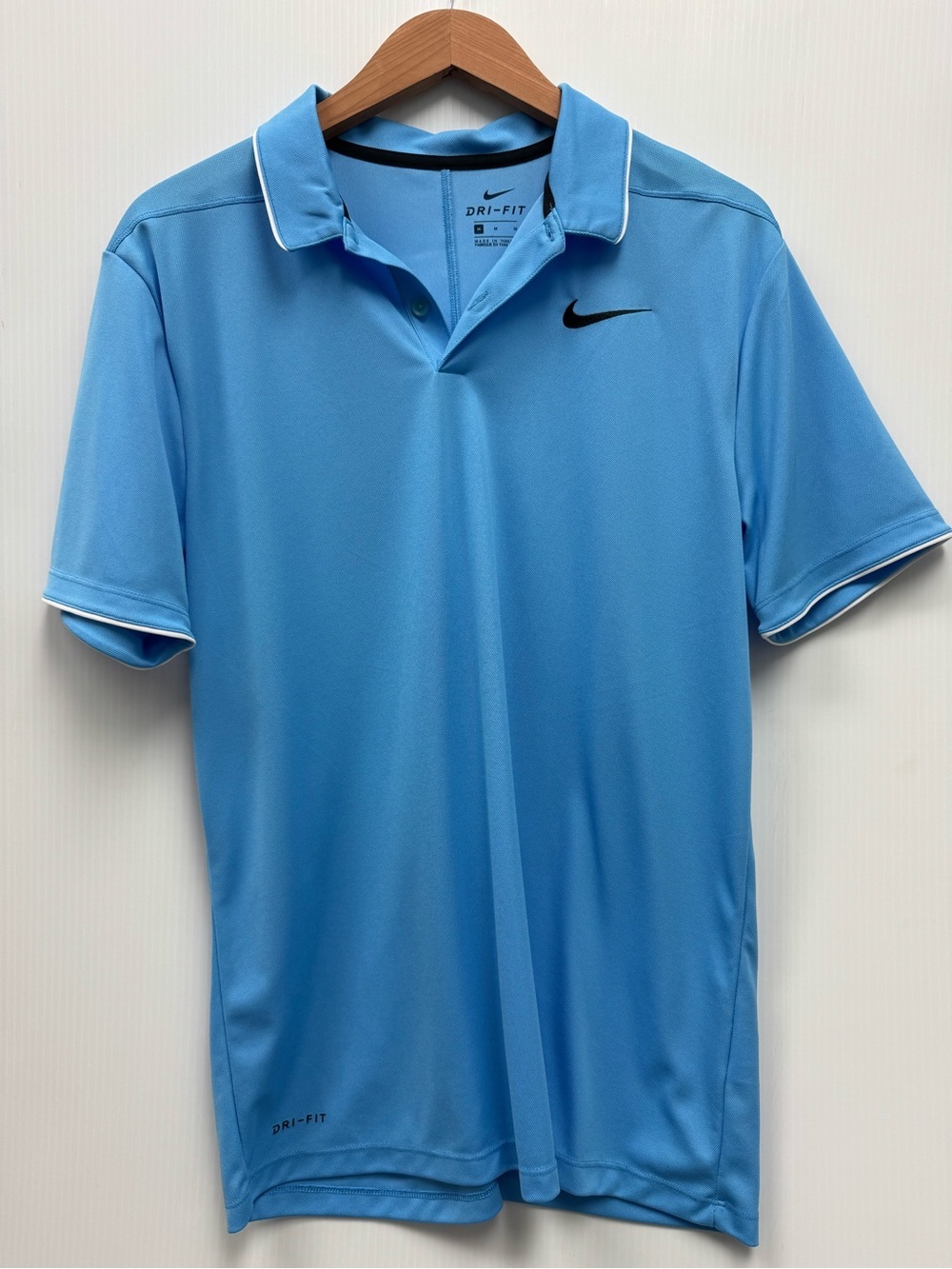 Nike Men's Light Blue Polo with Black Swoosh